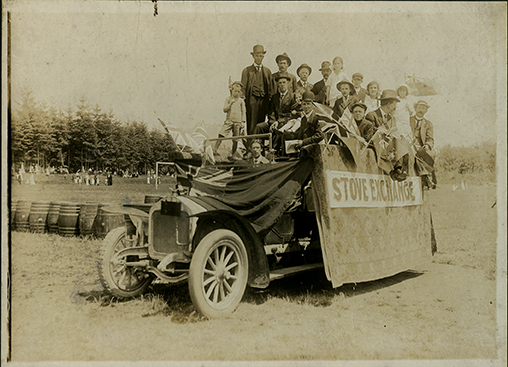 “Dominion Day Stove Exchange, Third and Lonsdale, Mahon Park,” 1915,  gelatin silver print (1558)