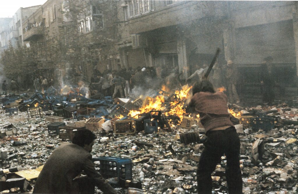 Gallery Invitation - back ( Image: Revolutionaries looting liquor stores and smashing bottles on the street. Oct 1978.