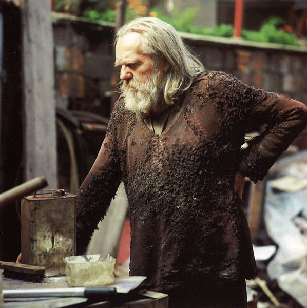 Miroslav Tichý in his courtyard, 1987. photo by Roman Buxbaum