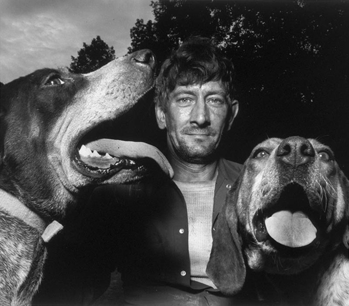 Shelby Lee Adams, Chester with Hounds, 1992. Silver gelatin print. Private Collection