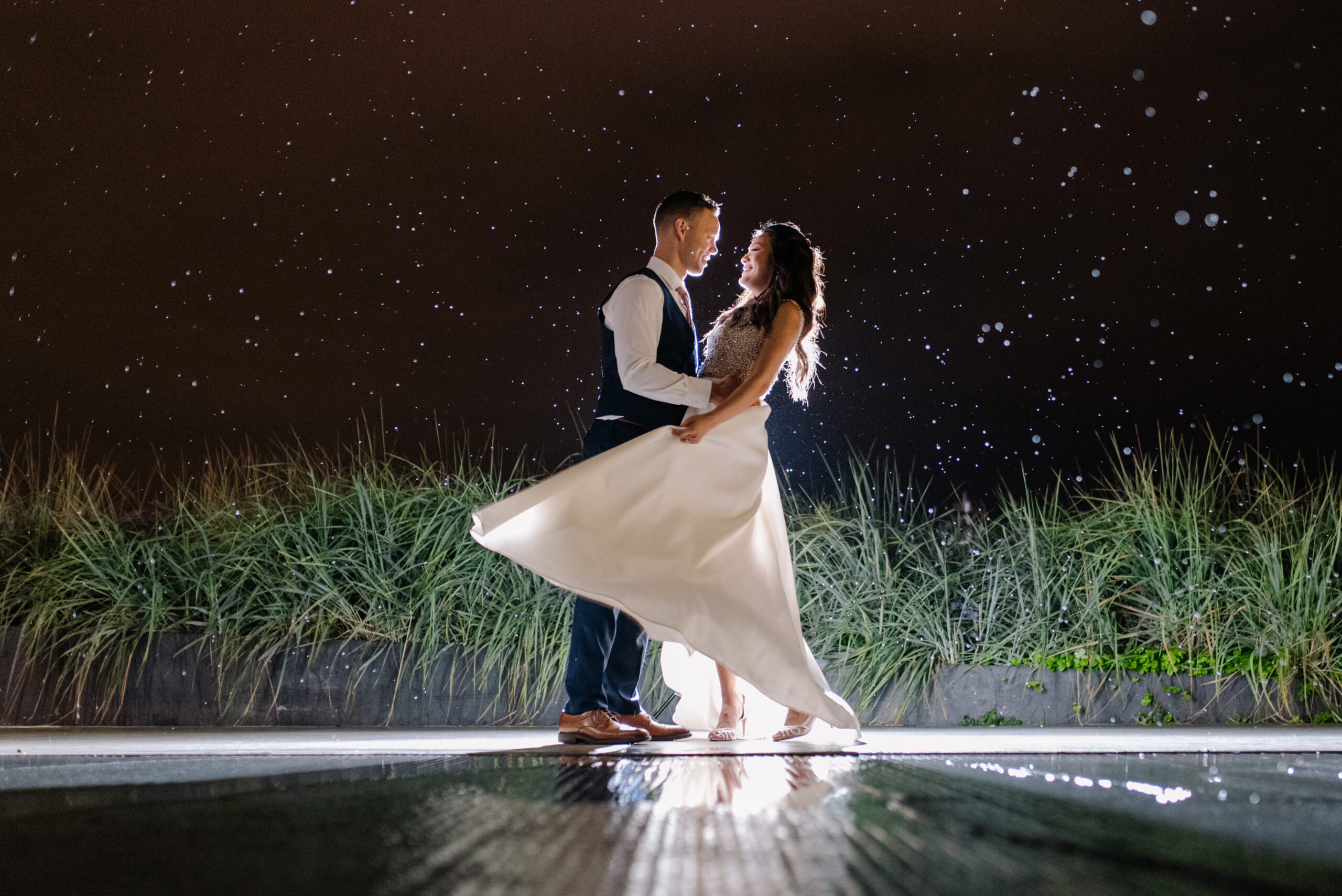 Bride & Groom in the rain